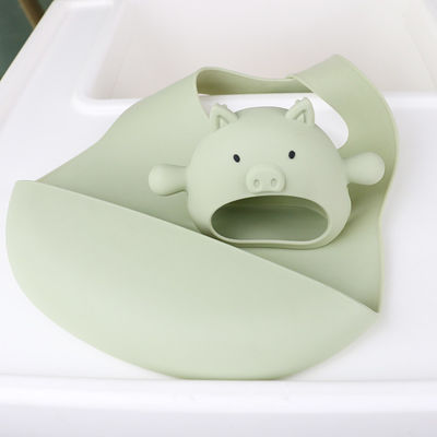Διάφορη σιλικόνη Teether πιασιμάτων λαβών μορφής χοίρων μορφών συνήθειας για το μωρό με τα διάφορα σχέδια