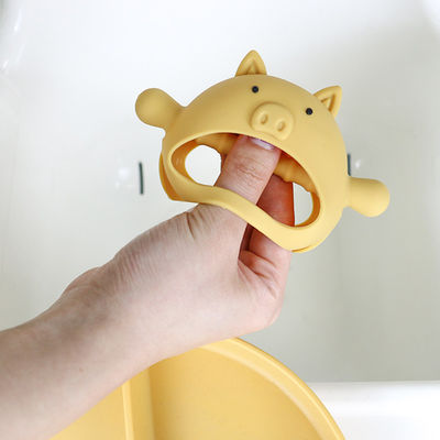 Διάφορη σιλικόνη Teether πιασιμάτων λαβών μορφής χοίρων μορφών συνήθειας για το μωρό με τα διάφορα σχέδια
