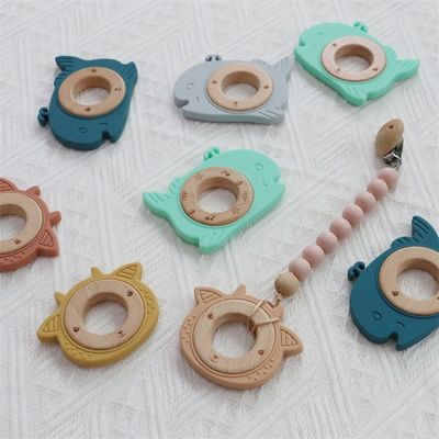 Πολυλειτουργικό Silicone Baby Teether με προσάρτημα Δοντιών ξύλινο δαχτυλίδι ζωικό μοτίβο