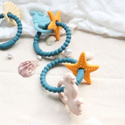 Τροφική Σιλικόνη Baby Teether με μη τοξικό σχεδιασμό και εύκολη λαβή χειραφέτησης BPA ελεύθερο Σιλικόνη δαχτυλίδια δόντια