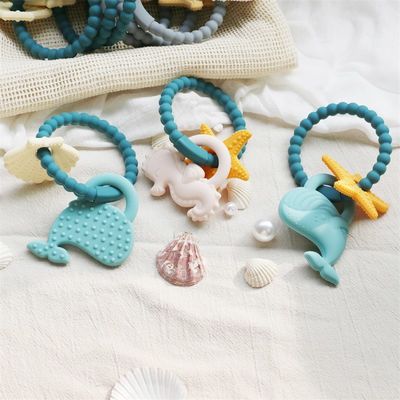 Τροφική Σιλικόνη Baby Teether με μη τοξικό σχεδιασμό και εύκολη λαβή χειραφέτησης BPA ελεύθερο Σιλικόνη δαχτυλίδια δόντια